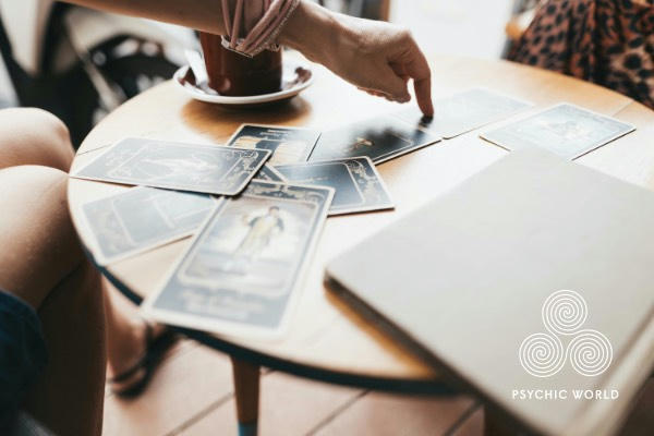 woman picking her card by point at it
