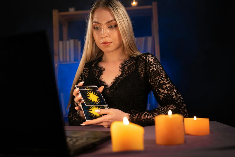 A tarot reader conducting an online reading.