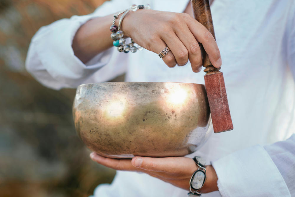 Tibetan singing bowl in sound therapy close-up.